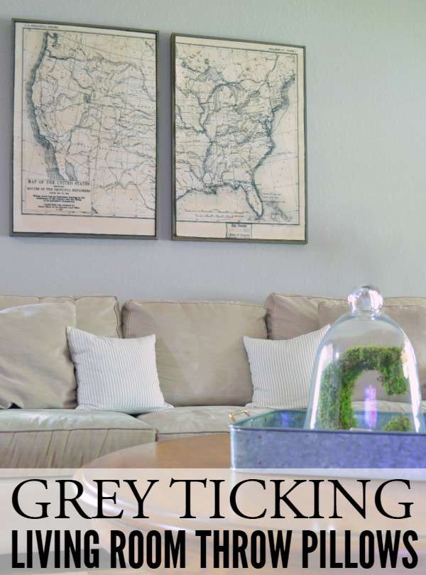 Grey ticking pillows- on couch from afar with graphic